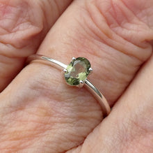 Load image into Gallery viewer, Moldavite Ring | Faceted Oval | Dainty Solitaire Style |  925 Sterling Silver | Open back | US Size 6, 7, 7.75, 8 | Green Obsidian |  CZ Republic | Intense Personal Heart Transformation | Scorpio Stone | Genuine Gems from Crystal Heart Melbourne Australia since 1986