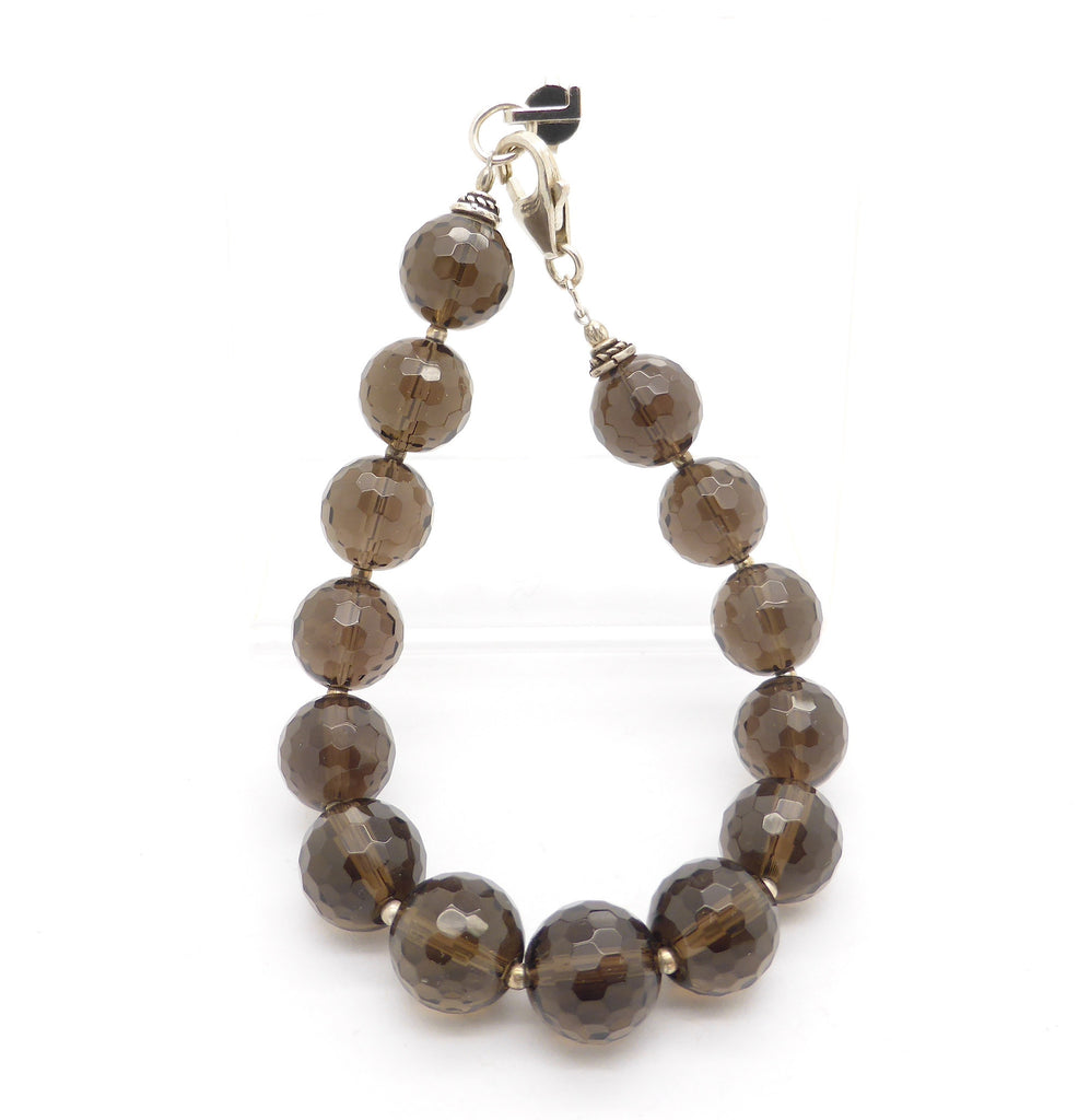 Faceted Smoky Quartz Beads Bracelet | 925 Sterling Silver and Tiger Tail | Nice mellow colour | Fair Trade and well made | Smoky is down to Earth in a conscious way empowering you to deal with physical issues internal or external | Genuine Gems from Crystal Heart Australia since 1986