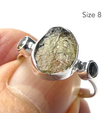 Load image into Gallery viewer, Raw Natural Moldavite Ring with faceted Moldavite outriders  | 925 Sterling Silver | Open back | US Size 7, 8, 8.25 | Green Obsidian |  CZ Republic | Intense Personal Heart Transformation | Scorpio Stone | Genuine Gems from Crystal Heart Melbourne Australia since 1986
