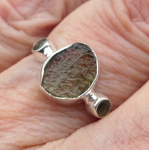 Load image into Gallery viewer, Raw Natural Moldavite Ring with faceted Moldavite outriders  | 925 Sterling Silver | Open back | US Size 7, 8, 8.25 | Green Obsidian |  CZ Republic | Intense Personal Heart Transformation | Scorpio Stone | Genuine Gems from Crystal Heart Melbourne Australia since 1986