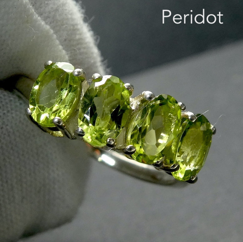 Peridot Ring | 4 Faceted Ovals | Line set with strong rounded claws | Beautiful Colour and Clarity | 925 Silver | Classic Elegance | US Size 5 |6 | 7 | 8 | 9 | 10 | Genuine gems from Crystal Heart Australia since 1986