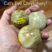Load image into Gallery viewer, Cat&#39;s Eye Chrysoberyl Crystal Sphere | Protection | Deep Thought | Positive | Calm | Genuine Gems from Crystal Heart Melbourne Australia since 1986