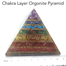 Load image into Gallery viewer, Orgonite Pyramid with genuine Chakra Stones | Clear Crystal Point conduit in Copper Spiral | Accumulate Orgone Energy | Balance and Energise whole system | Red Jasper, Carnelian, Golden Quartz, Emerald, Turquoise, Lapis Lazuli and Amethyst | Crystal Heart Melbourne Australia since 1986
