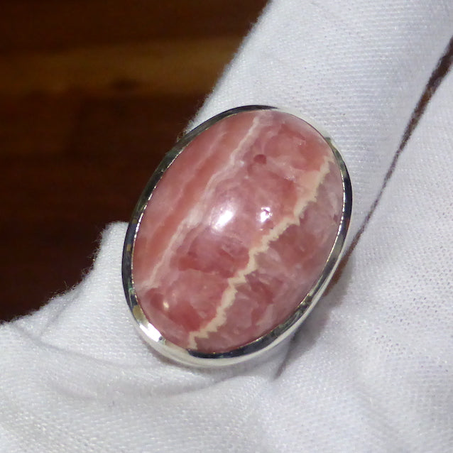 Rhodochrosite Ring | Deep Colour & Translucence | Oval Cab | Besel Set with open back | Comfy split band | 925 Sterling Silver | US size adjustable 7 to 8.5 | Passionate Heart | Loving Dream realisation | Genuine Gems from Crystal Heart Australia since 1986