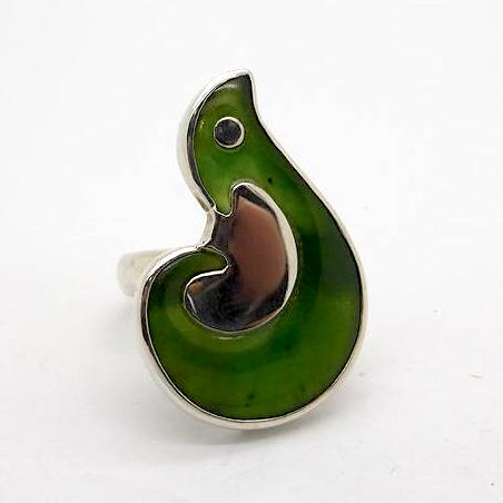 NZ Nephrite Jade Fish Hook set in Sirling Silver.the dark are in the centre is also Silver but picked up a reflection. Weight 7.6 gm, stone 20 x 30 mm, size #8 (US)