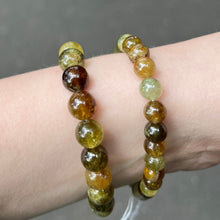 Load image into Gallery viewer, Greet Garnet (Grossular) | Heart Stone | Energising | Creativity | Spiritual Empowerment | Genuine Gems from Crystal Heart Melbourne Australia since 1986Green Garnet Bracelet | Grossular Gooseberry Green | Rare | Fair Trade Stretch Bracelet | Heart Stone | Energising | Creativity | Spiritual Empowerment | All is Well | Genuine Gems from Crystal Heart Melbourne Australia since 1986