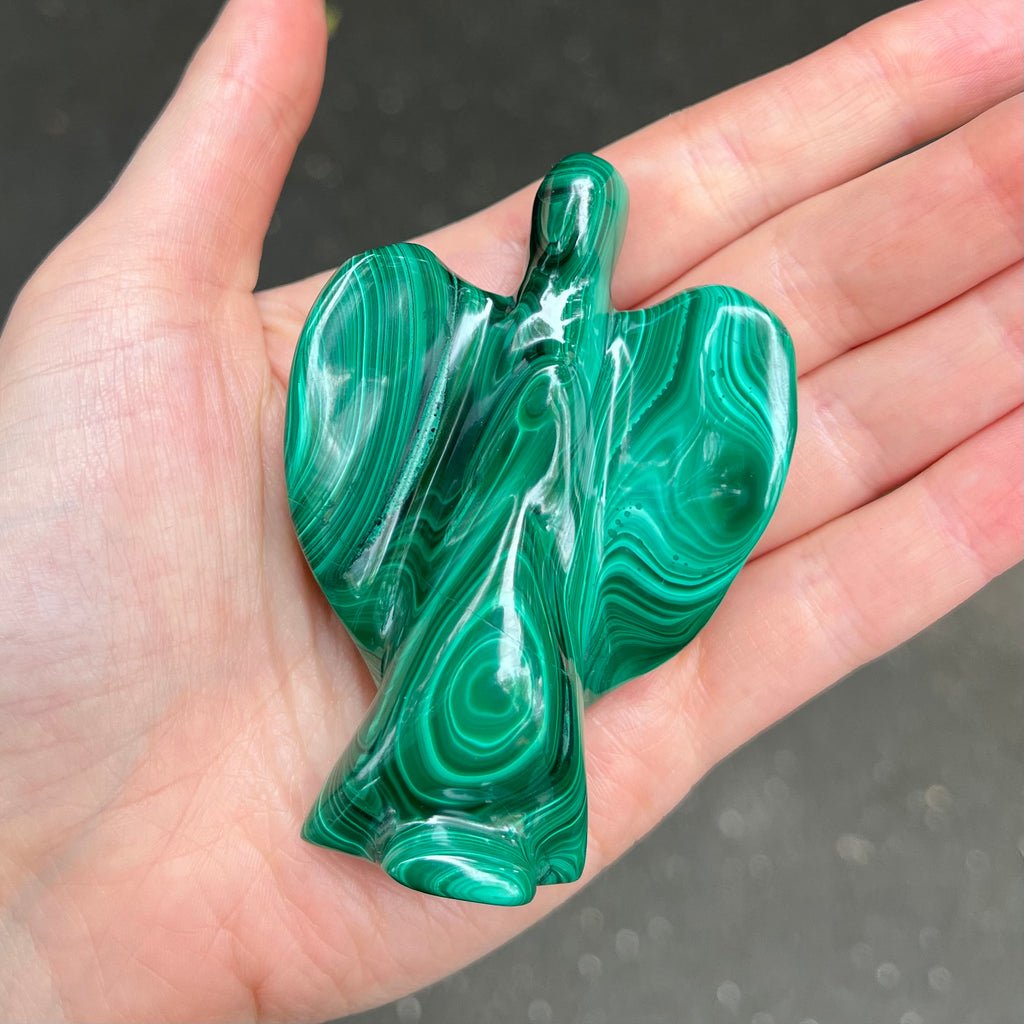 Malachite Angel Carving | Beautiful material from the Congo | Complex and fascinating swirls and rosettes | Pockets and caves sparkle with crystalline Malachite | Genuine Gems from Crystal Heart Melbourne Australia since 1986