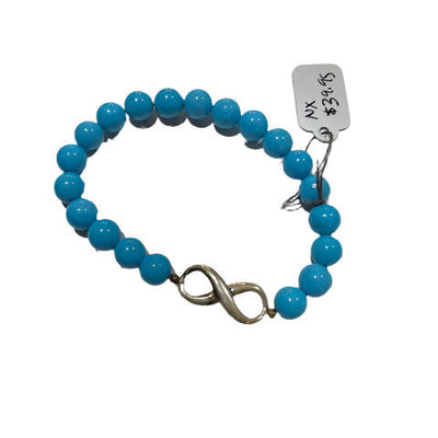 Blue beaded bracelet with a silver clasp on a white background
