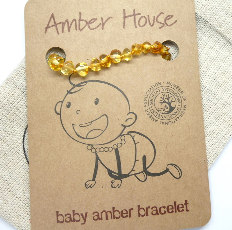 Baby Teething Bracelet | Baltic Amber Freeform Nuggets | Strong Screw Clasp | knotted between nuggets | Strong Coated THread | Genuine Gems from Crystal heart Melbourne Australia since 1986