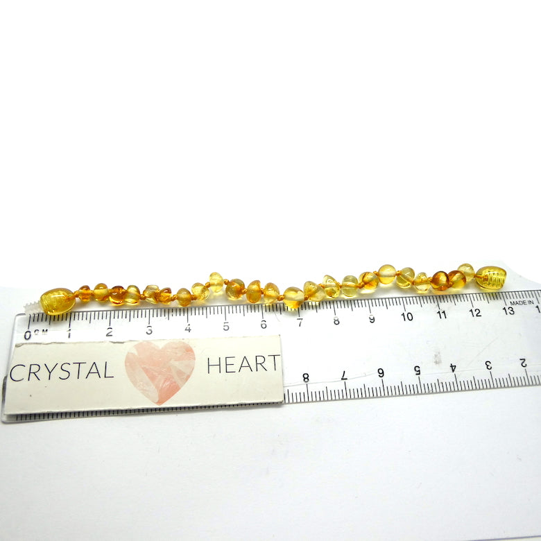 Baby Teething Bracelet | Baltic Amber Freeform Nuggets | Strong Screw Clasp | knotted between nuggets | Strong Coated THread | Genuine Gems from Crystal heart Melbourne Australia since 1986