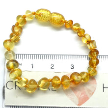 Load image into Gallery viewer, Baby Teething Bracelet | Baltic Amber Freeform Nuggets | Strong Screw Clasp | knotted between nuggets | Strong Coated THread | Genuine Gems from Crystal heart Melbourne Australia since 1986