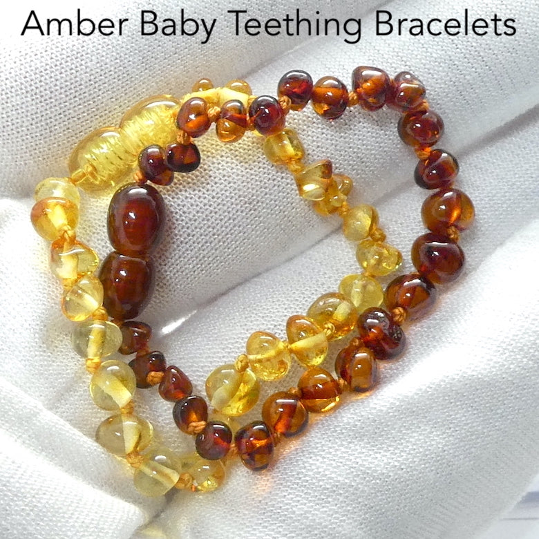 Baby Teething Bracelet | Baltic Amber Freeform Nuggets | Strong Screw Clasp | knotted between nuggets | Strong Coated THread | Genuine Gems from Crystal heart Melbourne Australia since 1986