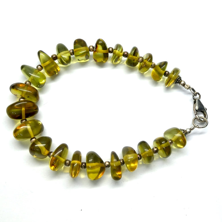 Green Baltic Amber Bracelet | Polished Freeform Nuggets | Beaded with 925 Silver Clasp and Spacer beads between the nuggets | Genuine Gems from Crystal heart Melbourne Australia since 1986