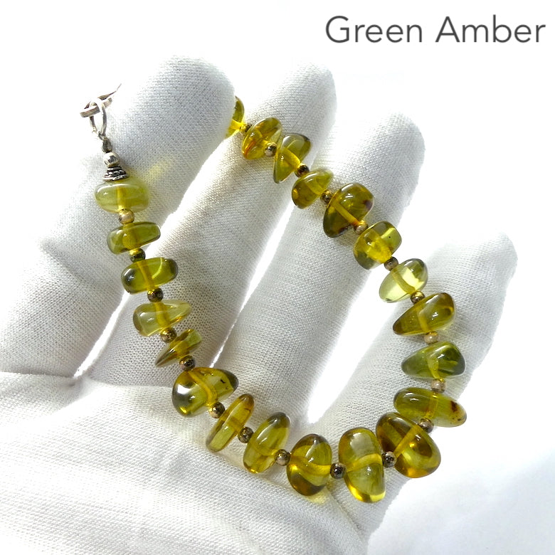 Green Baltic Amber Bracelet | Polished Freeform Nuggets | Beaded with 925 Silver Clasp and Spacer beads between the nuggets | Genuine Gems from Crystal heart Melbourne Australia since 1986