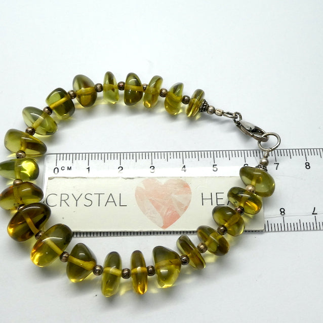 Green Baltic Amber Bracelet | Polished Freeform Nuggets | Beaded with 925 Silver Clasp and Spacer beads between the nuggets | Genuine Gems from Crystal heart Melbourne Australia since 1986