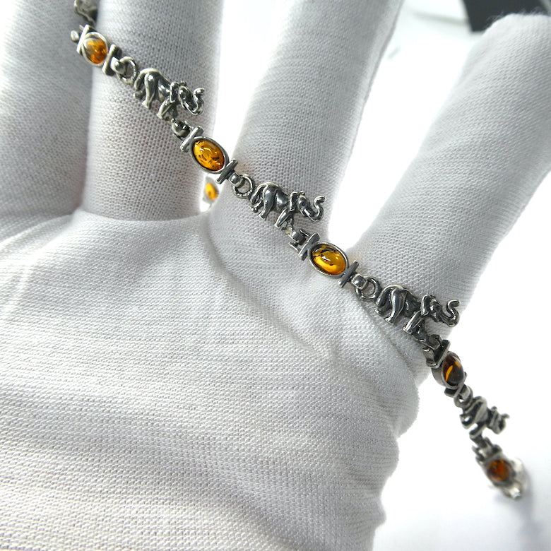 Baltic Amber Bracelet | Dainty | Oval cabochons alternate with Silver Elephants |  Genuine Gems from Crystal heart Melbourne Australia since 1986