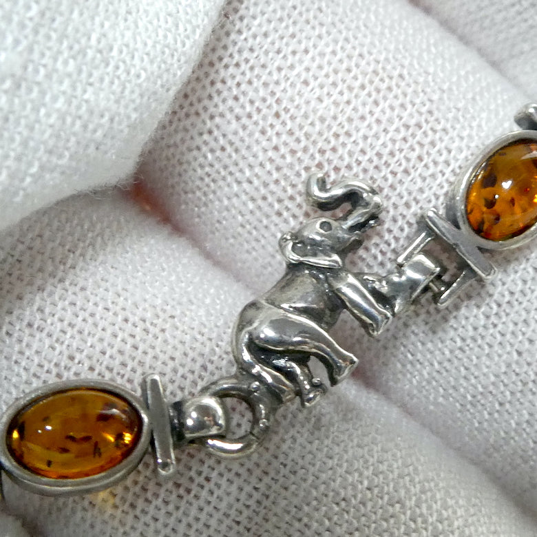 Baltic Amber Bracelet | Dainty | Oval cabochons alternate with Silver Elephants |  Genuine Gems from Crystal heart Melbourne Australia since 1986