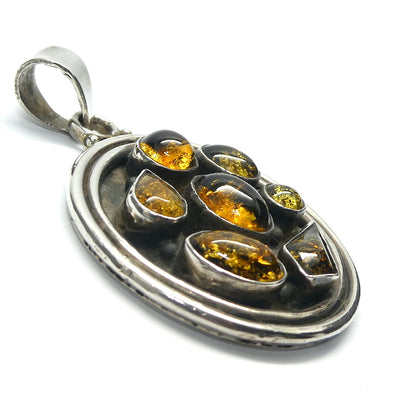 Amber Pendant | Seven Dark Amber Cabochons  | Heavy Sterling Silver Disc |  Oxidised | Mediaeval or Gothic Look | Genuine Gems from Crystal heart Melbourne Australia since 1986