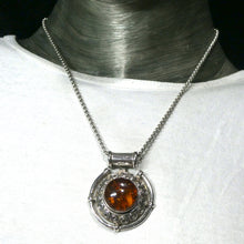 Load image into Gallery viewer, Amber Pendant | Large Round Cabochon  |  Sterling Silver Disc |  Celtic Scroll and Rope Work | Genuine Gems from Crystal heart Melbourne Australia since 1986