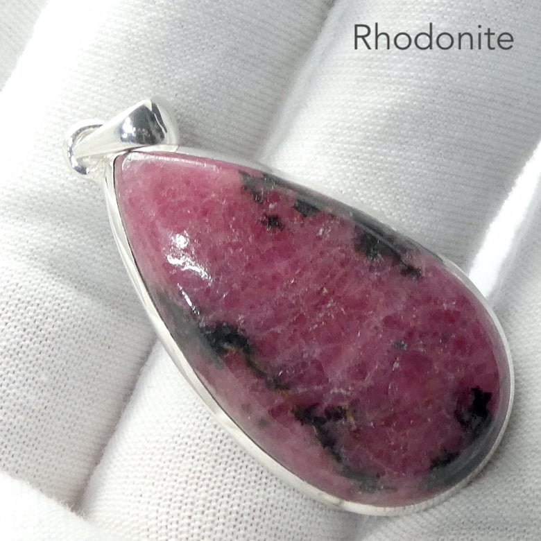 Rhodonite Pendant | Deep Red Pink with Black Veins | Teardrop Cabochon | 925 Sterling Silver |  Simple Bezel | Open Back | Emotionally loving grounded harmony | Genuine Gems from Crystal Heart Melbourne Australia since 1986Rhodonite Pendant | Deep Red Pink with Black Veins | Teardrop Cabochon | 925 Sterling Silver |  Simple Bezel | Open Back | Emotionally loving grounded harmony | Genuine Gems from Crystal Heart Melbourne Australia since 1986