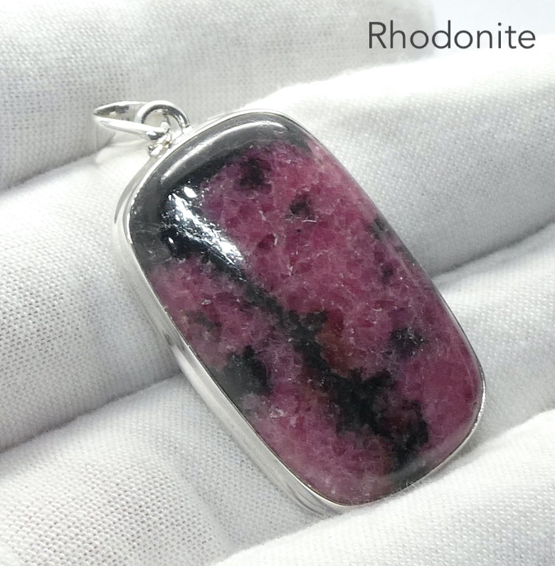 Rhodonite Pendant | Deep Red Pink with Black Veins | Oblong Cabochon | 925 Sterling Silver |  Simple Bezel | Open Back | Emotionally loving grounded harmony | Genuine Gems from Crystal Heart Melbourne Australia since 1986