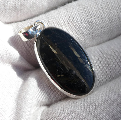 Nuummite Pendant | 925 Sterling Silver | Oval Cabochon | Black with Golden Flecks | Soul Retrieval | Clear emotional entanglements | Genuine Gemstones from Crystal Heart Melbourne Australia since 1986 | nuumite | nummite