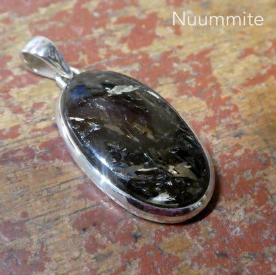 Nuummite Pendant | 925 Sterling Silver | Oval Cabochon | Black with Golden Flecks | Soul Retrieval | Clear emotional entanglements | Genuine Gemstones from Crystal Heart Melbourne Australia since 1986 | nuumite | nummite