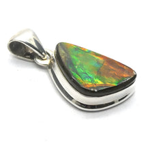 Load image into Gallery viewer, Ammolite Pendant | Freeform Cabochon | Bright Green and Golden Orange Flash | Dragon Scale | 925 Sterling Silver | Opalised Fossil Ammonite | Canadian Gemstone | Genuine Gems from Crystal Heart Melbourne Australia since 1986