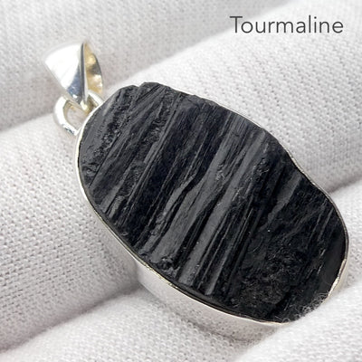 Black Tourmaline Pendant | Raw unpolished crystal | Oval shape | Bezel set | 925 Sterling Silver | Genuine Gems from Crystal Heart Melbourne Australia since 1986