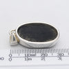 Black Tourmaline Pendant | Raw unpolished crystal | Oval shape | Bezel set | 925 Sterling Silver | Genuine Gems from Crystal Heart Melbourne Australia since 1986