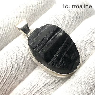 Black Tourmaline Pendant | Raw unpolished crystal | Oval shape | Bezel set | 925 Sterling Silver | Genuine Gems from Crystal Heart Melbourne Australia since 1986