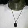 Black Tourmaline Pendant | Raw unpolished crystal | Oval shape | Bezel set | 925 Sterling Silver | Genuine Gems from Crystal Heart Melbourne Australia since 1986