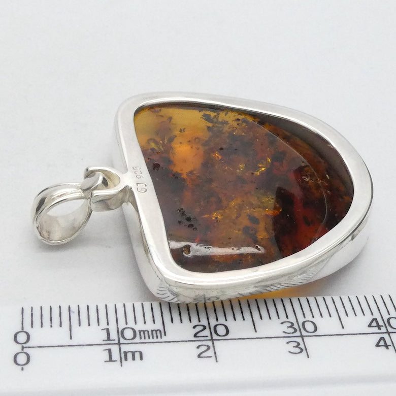 Amber Pendant | Large Freeform Cabochon  | Open Bezel Setting | 925 Sterling Silver | Genuine Gems from Crystal heart Melbourne Australia since 1986