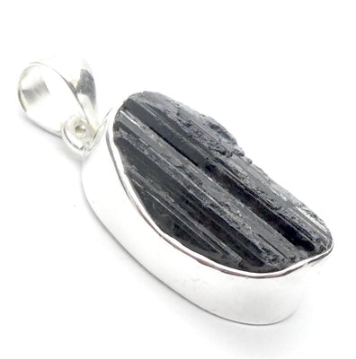 Black Tourmaline Pendant | Raw unpolished crystal | Ocval | Open Bezel set | 925 Sterling Silver | Genuine Gems from Crystal Heart Melbourne Australia est 1986