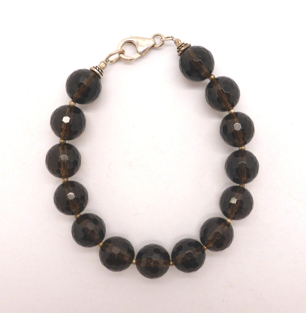 Faceted Smoky Quartz Beads Bracelet | 925 Sterling Silver and Tiger Tail | Nice mellow colour | Fair Trade and well made | Smoky is down to Earth in a conscious way empowering you to deal with physical issues internal or external | Genuine Gems from Crystal Heart Australia since 1986