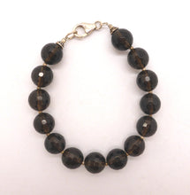 Load image into Gallery viewer, Faceted Smoky Quartz Beads Bracelet | 925 Sterling Silver and Tiger Tail | Nice mellow colour | Fair Trade and well made | Smoky is down to Earth in a conscious way empowering you to deal with physical issues internal or external | Genuine Gems from Crystal Heart Australia since 1986