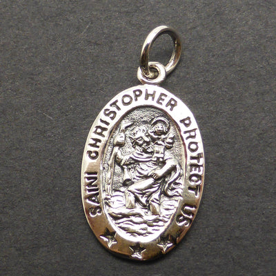 St Christopher carrying Jesus | 925 Sterling Silver | Christian medallion | Protection for travellers | Crystal Heart Melbourne Australia since 1986St Christopher carrying Jesus | 925 Sterling Silver | Small  Oval Pendant | Nice detail | Christian medallion | Protection for travellers | Crystal Heart Melbourne Australia since 1986