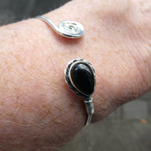 Load image into Gallery viewer, Black Onyx Gemstone Cuff Bracelet | Teardop Cabochon bezel set with detailed edging | Set on strong Silver wire ending in Celtic Spiral | Bangle Style | Bendy 925 Silver makes it adjustable Medium to Large wrist | Genuine Gemstones from Crystal Heart Melbourne Australia since 1986