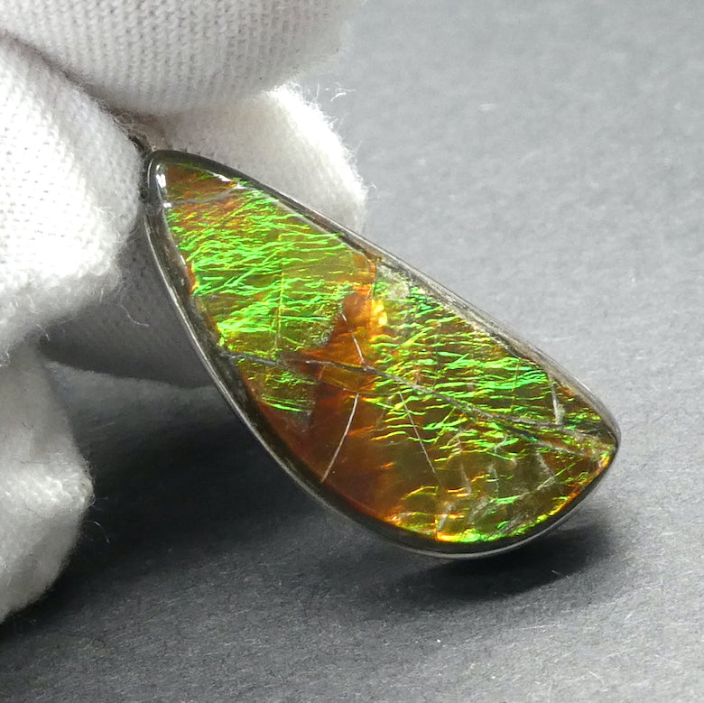 Ammolite Pendant | Freeform Cabochon | Bright Green and Golden Orange Flash | Dragon Scale | 925 Sterling Silver | Opalised Fossil Ammonite | Canadian Gemstone | Genuine Gems from Crystal Heart Melbourne Australia since 1986