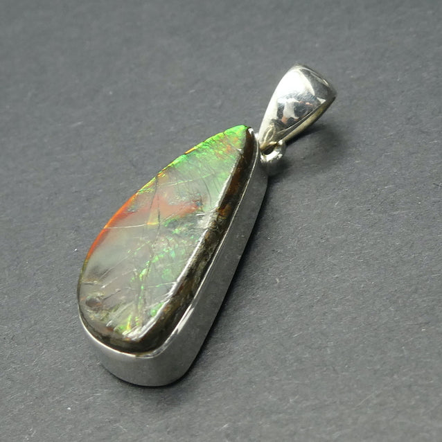 Ammolite Pendant | Freeform Cabochon | Bright Green and Golden Orange Flash | Dragon Scale | 925 Sterling Silver | Opalised Fossil Ammonite | Canadian Gemstone | Genuine Gems from Crystal Heart Melbourne Australia since 1986