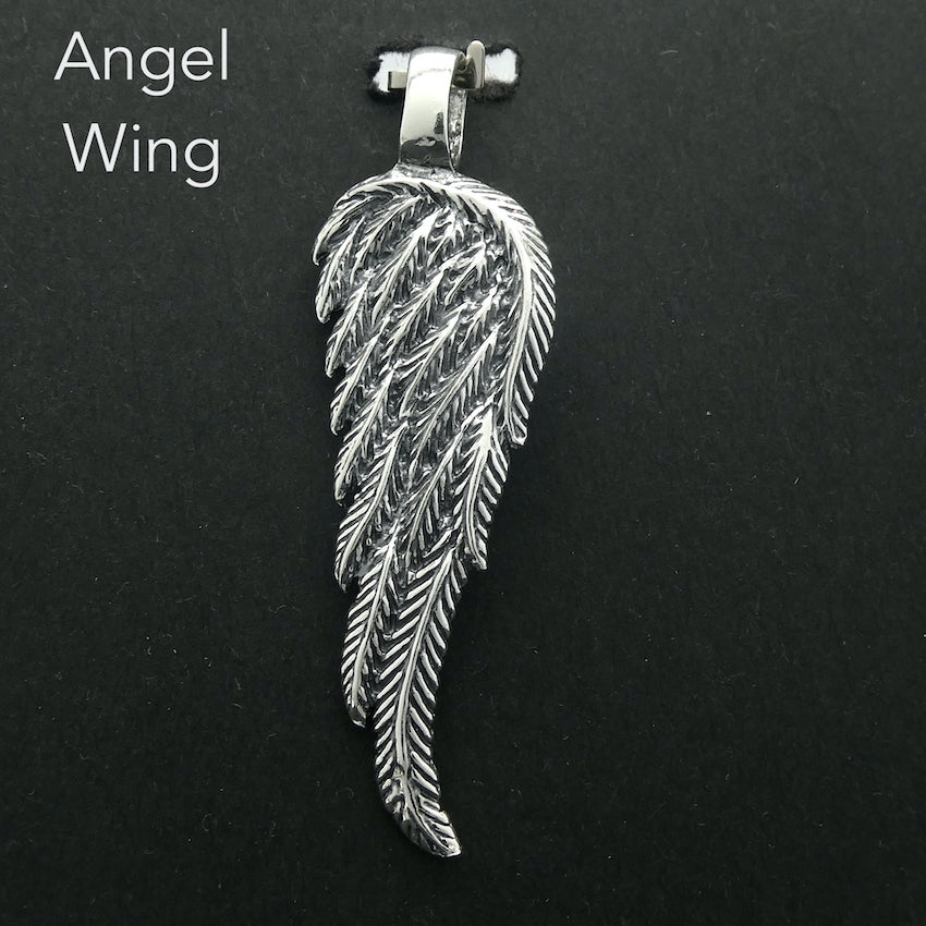 Angel Wing Pendant | Long Elegant Styling | beautifully executed detail | Reversible | 925 Oxidised Sterling Silver | Crystal Heart Melbourne Australia since 1986