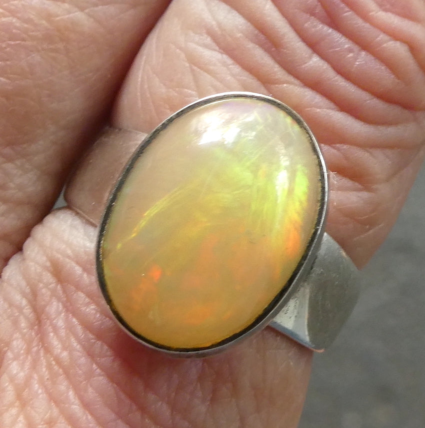 Ethiopian Opal Gemstone Ring | Large Solid Oval Cabochon  | Very Lively Display of Colours | Bright Reds, Oranges and Greens |  US Size 10 | AUS Size T1/2  Genuine Gemstones from  Crystal Heart Australia since 1986