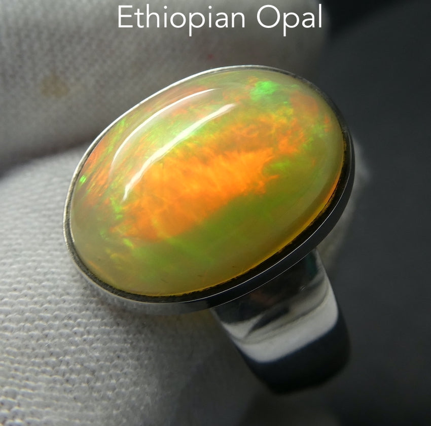 Ethiopian Opal Gemstone Ring | Large Solid Oval Cabochon  | Very Lively Display of Colours | Bright Reds, Oranges and Greens |  US Size 10 | AUS Size T1/2  Genuine Gemstones from  Crystal Heart Australia since 1986