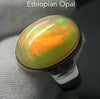 Ethiopian Opal Gemstone Ring | Large Solid Oval Cabochon  | Very Lively Display of Colours | Bright Reds, Oranges and Greens |  US Size 10 | AUS Size T1/2  Genuine Gemstones from  Crystal Heart Australia since 1986