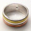 Spinning Ring 3 tone colour | 925 Sterling Silver | Bronze, Copper and Silver spinning bands held by silver rope work | Attractive and relaxing by spinning the bands when stressed | Crystal Heart Melbourne Australia since 1986