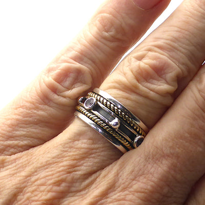 Spinner Ring with Peridot | 2 tone | 925 Sterling Silver | 4 Faceted stones set in spinning band over oxidised Silver held by Gold Plated Knotwork | Steampunk | Crystal Heart Melbourne Australia since 1986