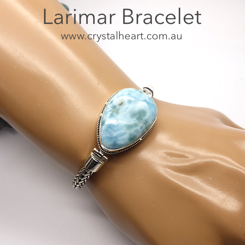 Larimar Bracelet ~ Large Teardrop | Open backed setting with Silver Rope work around Besel which blends  with the sturdy flexible woven silver band | Strong well made hinge connection between band and besel |  Strong Clasp with  safety attachment | 925 Sterling Silver | Length 185 mm | Dominican Republic Caribbean | Leo Stone | Pectolite | Genuine Gems from Crystal Heart Melbourne Australia since 1986
