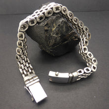 Load image into Gallery viewer, Bracelet with 4 flexible rows of substantial silver links |  925 Sterling Silver |205 mm long | 11 mm wide 5 mm deep | Strong Push Pull Clasp | Masculine style with a touch of class | Crystal Heart Melbourne Australia since 1986