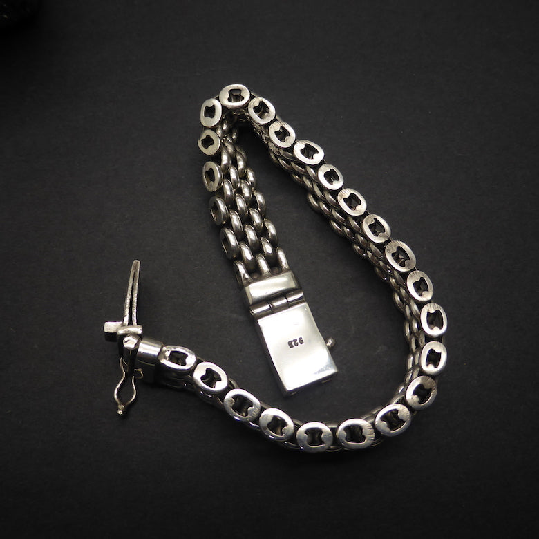 Bracelet with 4 flexible rows of substantial silver links |  925 Sterling Silver |205 mm long | 11 mm wide 5 mm deep | Strong Push Pull Clasp | Masculine style with a touch of class | Crystal Heart Melbourne Australia since 1986