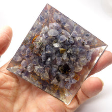 Load image into Gallery viewer, Orgonite Pyramid with genuine Iolite Chips | Clear Crystal Point conduit in Copper Spiral | Accumulate Orgone Energy | Iolite is also known as Water Sapphire | Visualisation, Spiritual Direction also very grounded.| Crystal Heart Melbourne Australia since 1986